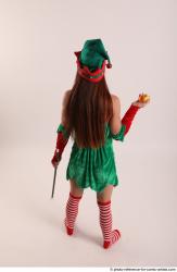 Veronika Elf Pose With Apple